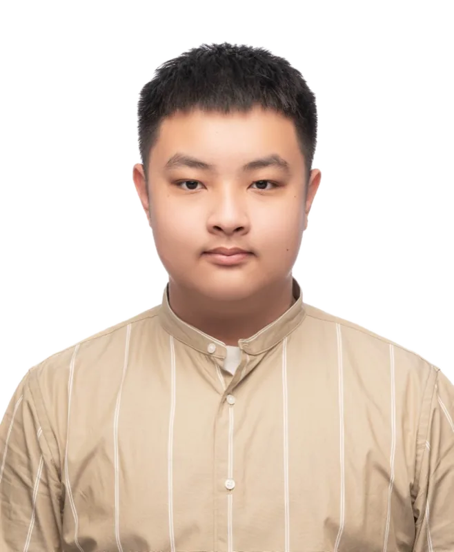 Bryan Chen in a beige striped shirt, head and shoulders.